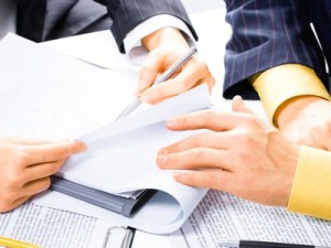 Image of people’s hands during business conversation